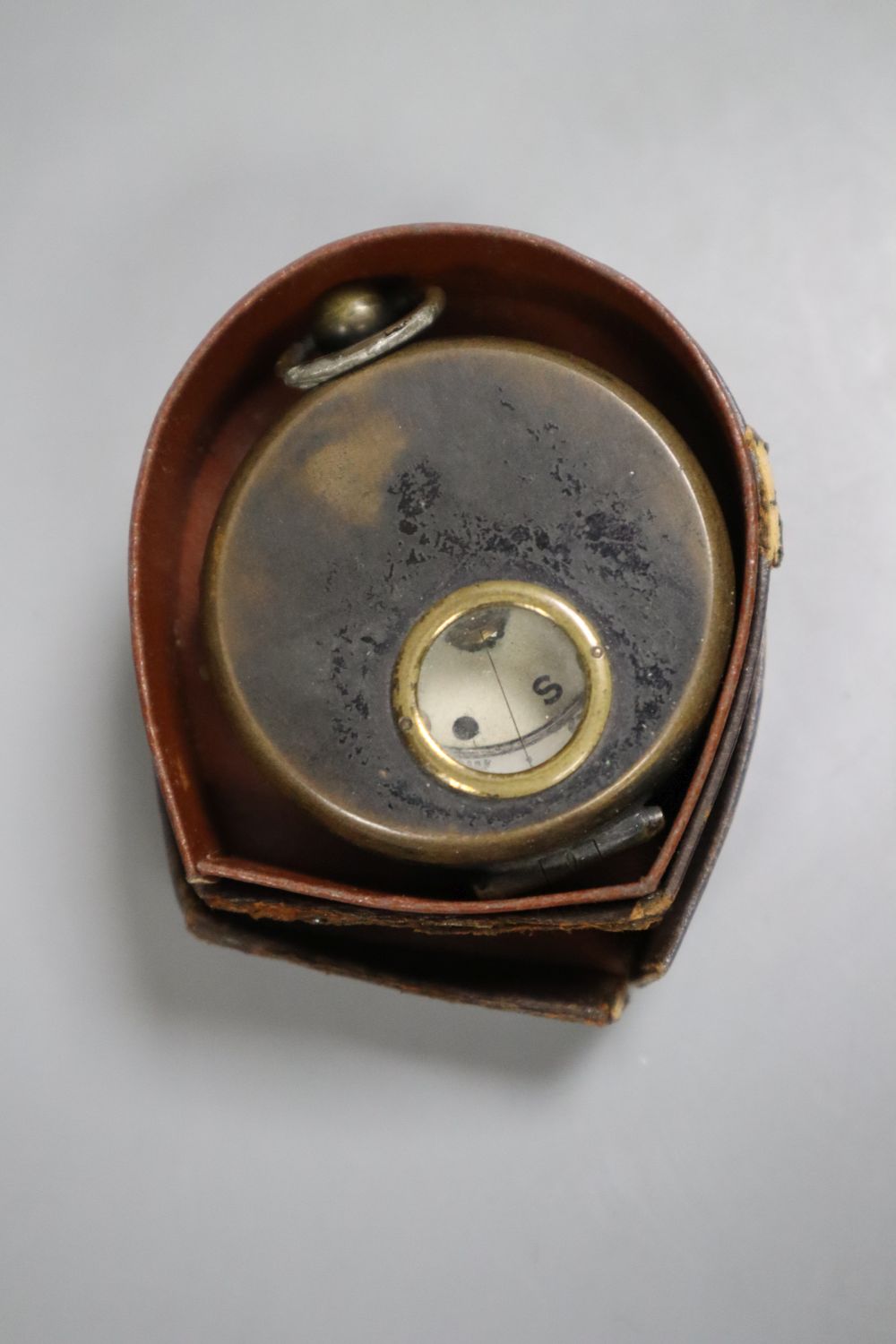 Two pocket compasses and two telescopes, one being by Dixey